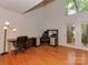 Bright office space features hardwood floors, a large window, and built-in storage at 4025 Woodfox Dr, Charlotte, NC 28277