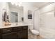 Cozy bathroom with vanity, toilet, and shower-tub combo at 4117 Galloway Park Dr, Charlotte, NC 28262