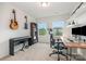 Well-lit office space with instruments, desk, and shelving at 4117 Galloway Park Dr, Charlotte, NC 28262