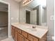 Bathroom with a wide mirror, vanity with sink, and view of the shower and toilet at 4208 Everest Dr, Gastonia, NC 28054