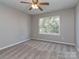 A light-filled bedroom features carpet, a ceiling fan, a window for natural light, creating a peaceful retreat at 4208 Everest Dr, Gastonia, NC 28054