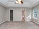 Bedroom with neutral walls, carpet, and natural light from a window at 4208 Everest Dr, Gastonia, NC 28054