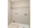 Laundry room with tile flooring, utility sink, and hookups for washer and dryer at 4208 Everest Dr, Gastonia, NC 28054