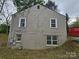 Rear exterior of the house, revealing multiple windows on the building at 435 W Sharpe St, Statesville, NC 28677