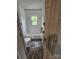 Small bathroom featuring a shower-tub combination with wood look floors at 435 W Sharpe St, Statesville, NC 28677