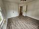 Bedroom showcasing hardwood floors and natural light from a window at 435 W Sharpe St, Statesville, NC 28677