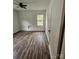 Bedroom showcasing hardwood floors and natural light from a window at 435 W Sharpe St, Statesville, NC 28677