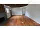 Living room with a fireplace and original hardwood flooring at 435 W Sharpe St, Statesville, NC 28677