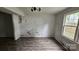 Room with laminate flooring featuring a window for light at 435 W Sharpe St, Statesville, NC 28677
