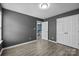 Bedroom featuring modern flooring, neutral walls, and an open doorway at 4658 Cedar Rock Dr, Charlotte, NC 28273