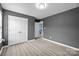 Neutral bedroom showcasing wood flooring, neutral walls, and double closets at 4658 Cedar Rock Dr, Charlotte, NC 28273