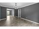 The dining room showcases an open floor plan and hardwood flooring at 4658 Cedar Rock Dr, Charlotte, NC 28273