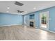 The light-filled living room has a fireplace and lots of space at 4658 Cedar Rock Dr, Charlotte, NC 28273