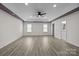Large main bedroom features tray ceiling, wood floors and generous natural light at 4658 Cedar Rock Dr, Charlotte, NC 28273