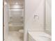 Well-lit bathroom featuring a shower-tub combo, modern vanity, and hexagon tile flooring at 5058 Beargrass Dr, Dallas, NC 28034