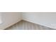 Corner of a bedroom with neutral carpet and base trim, showing electrical outlets at 5058 Beargrass Dr, Dallas, NC 28034