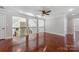 Spacious bonus room with hardwood floors, transom windows and staircase railing at 534 N Ingleside Farm Rd, Iron Station, NC 28080