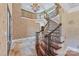 Grand foyer with winding staircase, decorative iron railing, chandelier, and high-end finishes at 534 N Ingleside Farm Rd, Iron Station, NC 28080