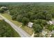 Aerial view of home with lush surrounding greenery and tree coverage at 5371 Davidson Rd, Davidson, NC 28036