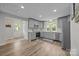 Modern kitchen features gray cabinets, stainless steel appliances, and stylish countertops at 5371 Davidson Rd, Davidson, NC 28036