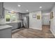 Modern kitchen features gray cabinets, stainless steel appliances, and stylish countertops at 5371 Davidson Rd, Davidson, NC 28036