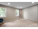 Spacious bedroom with two windows and a large closet for storage at 5604 Bethesda Ct, Charlotte, NC 28226