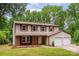 Charming home with a brick facade, two-car garage, and lush green lawn at 5604 Bethesda Ct, Charlotte, NC 28226