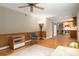 Inviting living room with hardwood floors, neutral walls, and open access to the kitchen area at 5604 Bethesda Ct, Charlotte, NC 28226