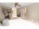 Comfortable main bedroom featuring a ceiling fan and an attached exercise area at 5604 Bethesda Ct, Charlotte, NC 28226