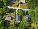 Aerial view of a home with a well-manicured backyard and a lush, green surrounding landscape at 6578 Bopre Ln, Denver, NC 28037