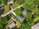 Aerial view of home in a neighborhood with mature trees and well-maintained lawns at 6578 Bopre Ln, Denver, NC 28037
