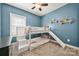 This bedroom has a bunk bed with a slide and shelves with toys at 6578 Bopre Ln, Denver, NC 28037