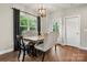 Charming dining area with ample light and a rustic wood table at 6578 Bopre Ln, Denver, NC 28037