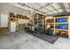 Spacious garage with ample storage shelving and room for a home gym at 6578 Bopre Ln, Denver, NC 28037