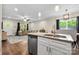 Open-concept kitchen with island flowing into the dining and living area at 6578 Bopre Ln, Denver, NC 28037