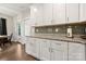 Kitchen features ample counter space and modern white cabinetry at 6578 Bopre Ln, Denver, NC 28037