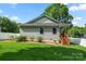The meticulously maintained yard includes tasteful landscaping and new perimeter fencing at 6578 Bopre Ln, Denver, NC 28037