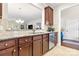 Modern kitchen featuring granite countertops, stainless steel appliances, and ample cabinet space at 7036 Kitty Hawk Ln, Fort Mill, SC 29707