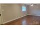 Bedroom with hardwood floors and a window at 8282 Park Edwards Rd, Kannapolis, NC 28081