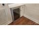 Features wine cooler nestled between cabinetry and marble countertop at 8282 Park Edwards Rd, Kannapolis, NC 28081