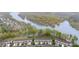 Gorgeous aerial view of homes near water with dense trees at 829 River Park Rd, Belmont, NC 28012