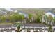 Aerial shot of townhomes with water views and mature trees at 829 River Park Rd, Belmont, NC 28012