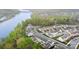 Wonderful aerial view showcasing community near water and beautiful trees at 829 River Park Rd, Belmont, NC 28012