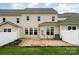 Well-maintained backyard featuring a lovely patio and ample green space at 829 River Park Rd, Belmont, NC 28012