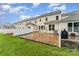 Charming backyard features brick paver patio, a privacy fence and well maintained lawn and landscaping at 829 River Park Rd, Belmont, NC 28012