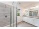 Bathroom featuring a glass shower, modern vanity, and granite countertops at 829 River Park Rd, Belmont, NC 28012