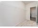 Walk-in closet features white wire shelving and neutral carpeting at 829 River Park Rd, Belmont, NC 28012