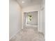 Hallway leading into a bedroom; neutral walls and carpet throughout at 829 River Park Rd, Belmont, NC 28012
