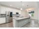 Open concept kitchen with granite island, stainless appliances, ample counter space, and eat in area at 829 River Park Rd, Belmont, NC 28012