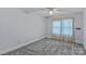 Neutral bedroom with soft carpet and natural light at 1000 Peachtree Rd, Charlotte, NC 28216